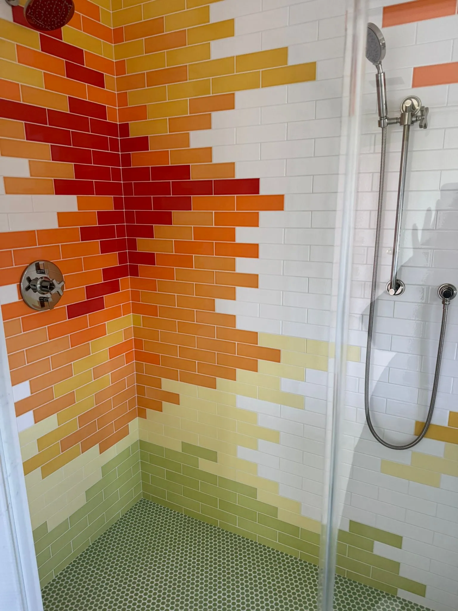Modern shower with light gray brick tile